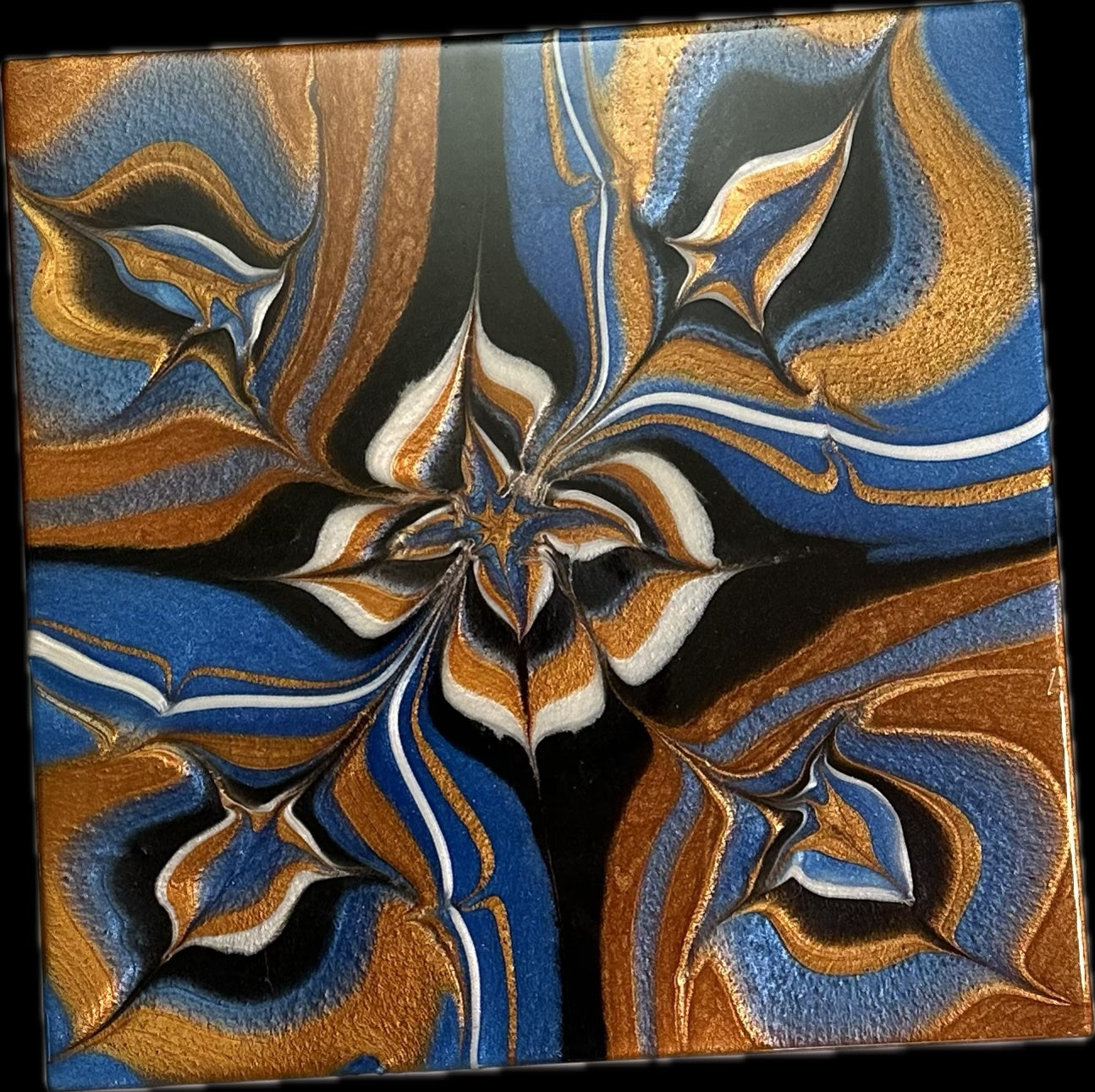Copper Compass on Blue Water